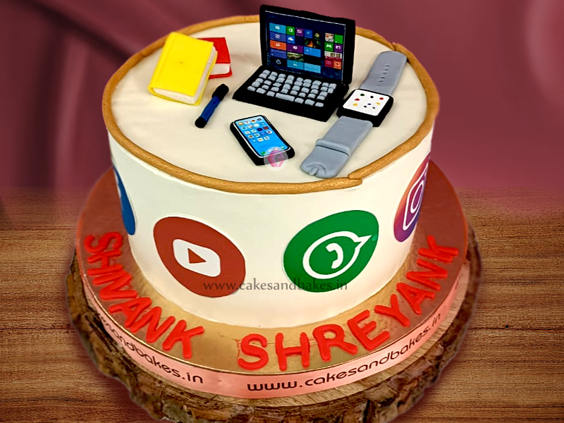Joy Of Baking  Theme cake for husbands birthday requested by his lovely  wife Toppers on cake Tablet Dumbbells Noddles Bowl Husband  with Laptop car Headphone  Visit our page for more
